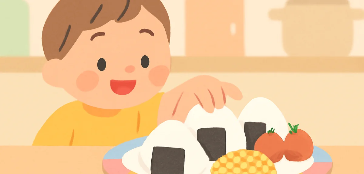 A child's hand reaching for a simple homemade lunch with onigiri, cherry tomatoes, and corn on a col