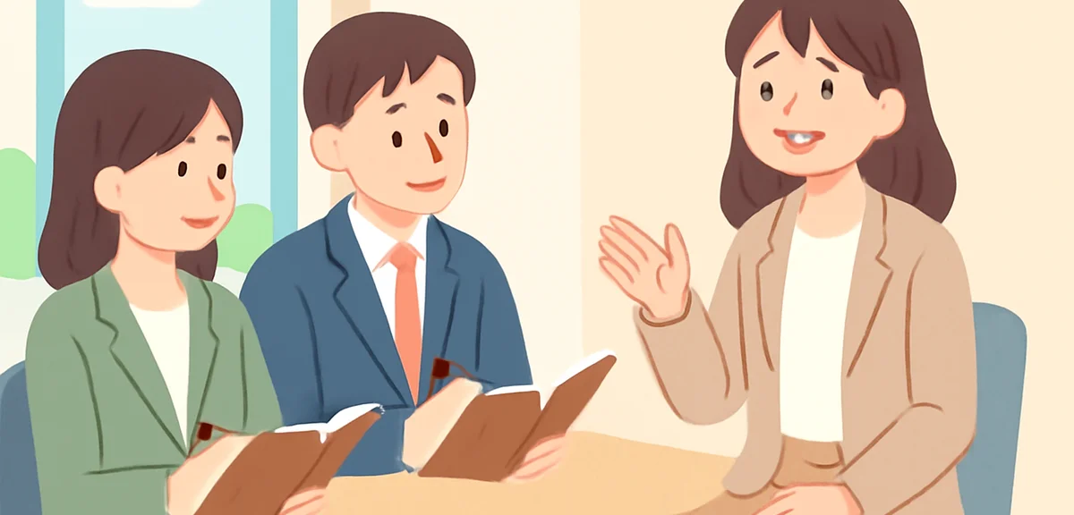 A Japanese university student in business casual clothing talking about her overseas volunteer exper