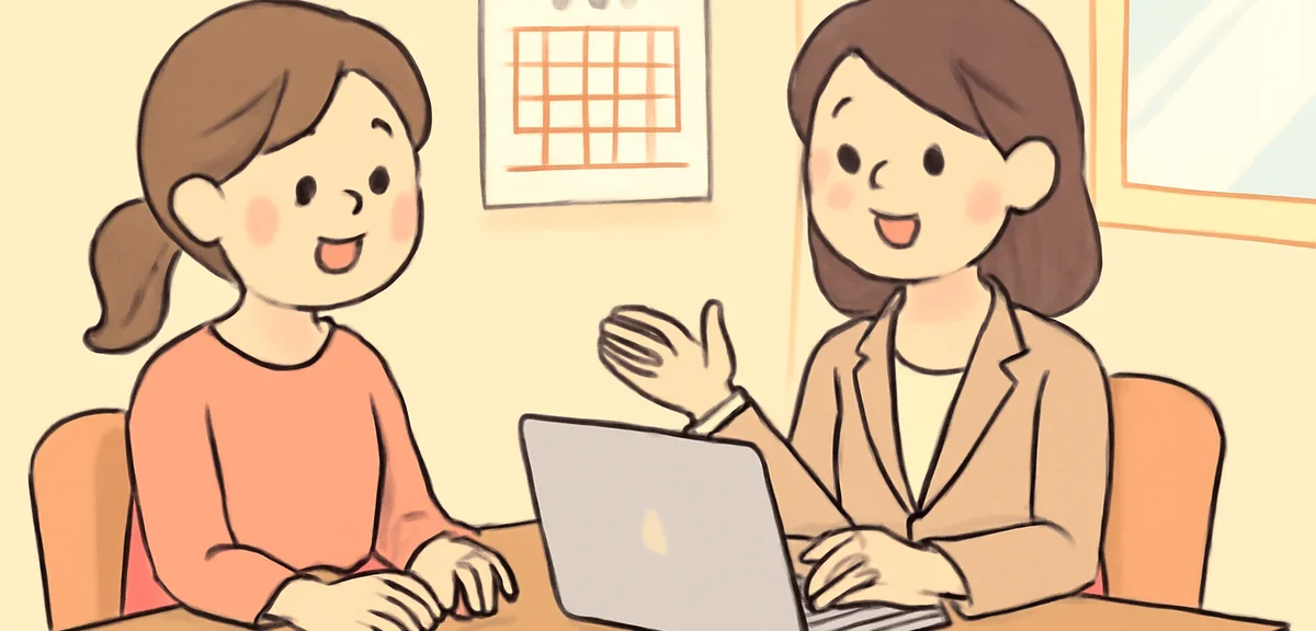 Japanese mother having a friendly interview with a female manager in a small bright office, both smi